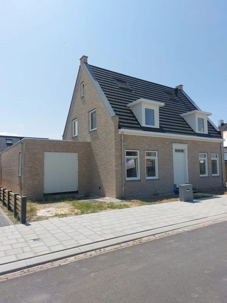 Zandsteen woning in Kruiningen door metselaar in Zeeland